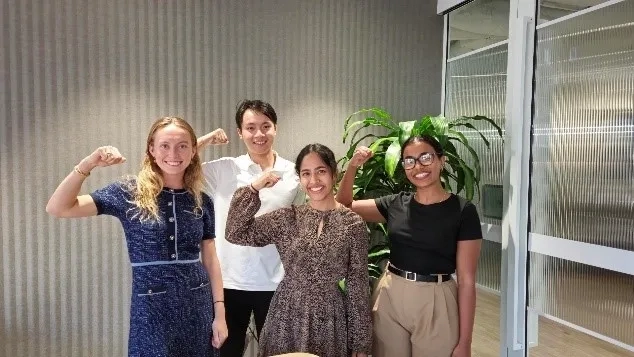 Protiviti Australia team uniting for International Women’s Day 2025, striking the pose in support of equity and progress – IWD2025